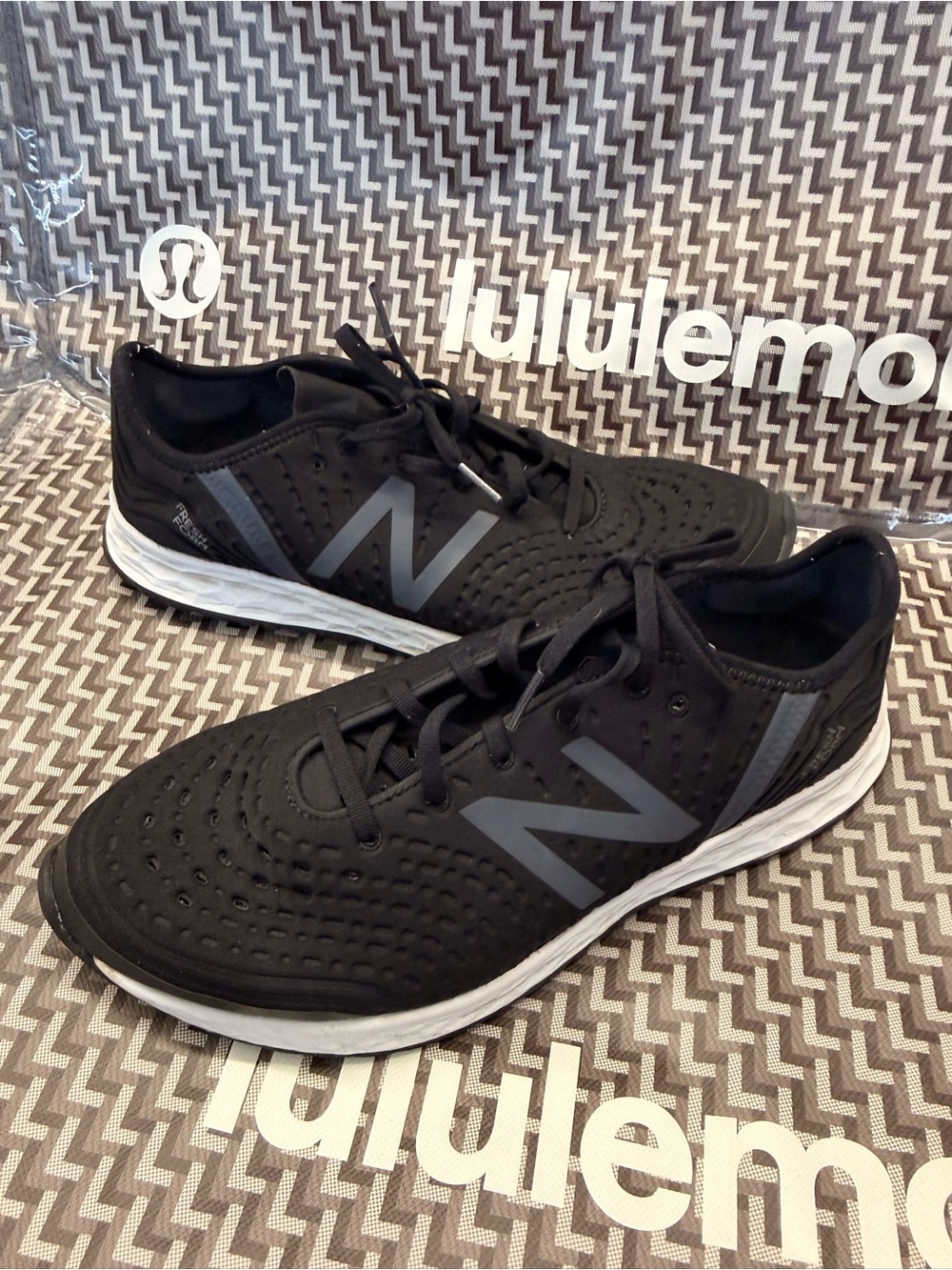 New Balance Men’s Black Sneakers with Gray Logo